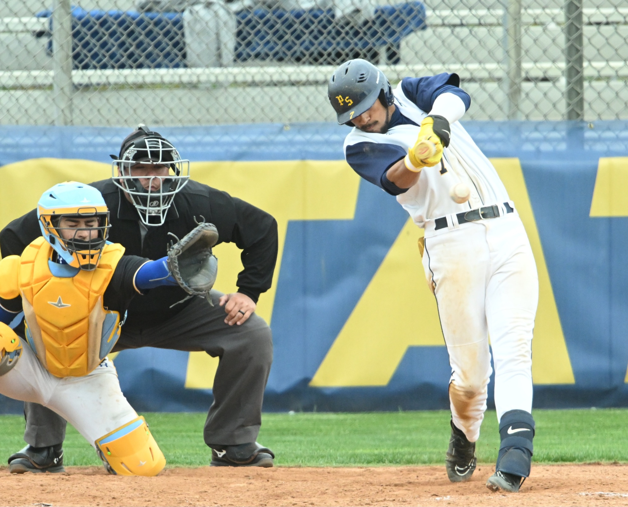 Lex Wescott connects for an RBI single during Potomac State's 6-5 win over Monroe Sunday afternoon at Golden Park.  Gameday photo by Raymond Burner.